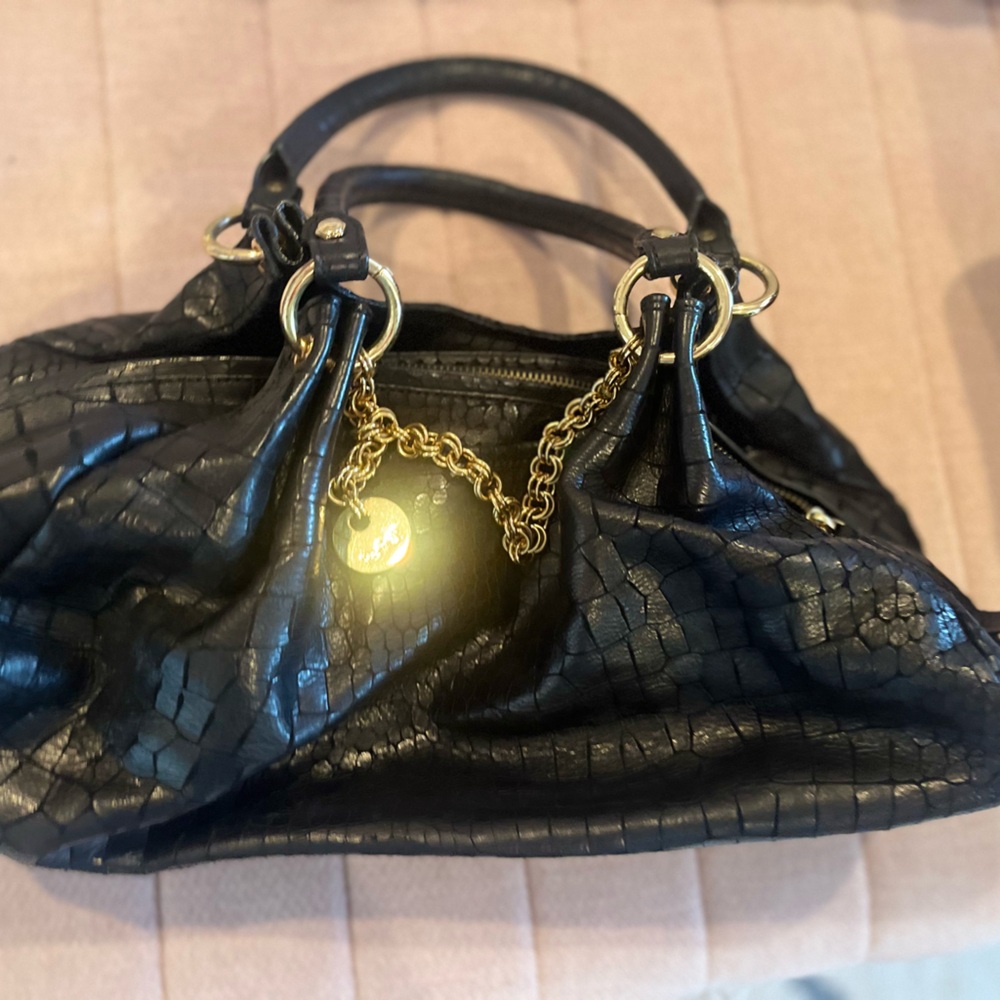 Black leather hobo style bag w gold trim